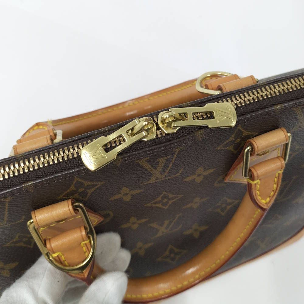 Louis Vuitton Alma Handbag Monogram — view 7