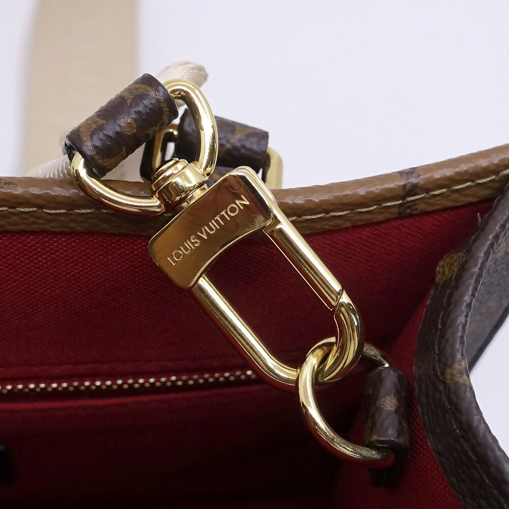 Louis Vuitton On The Go PM Handbag 2-Way Monogram Giant Reverse Gold — view 8