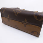 Louis Vuitton On The Go PM Handbag 2-Way Monogram Giant Reverse Gold — view 4