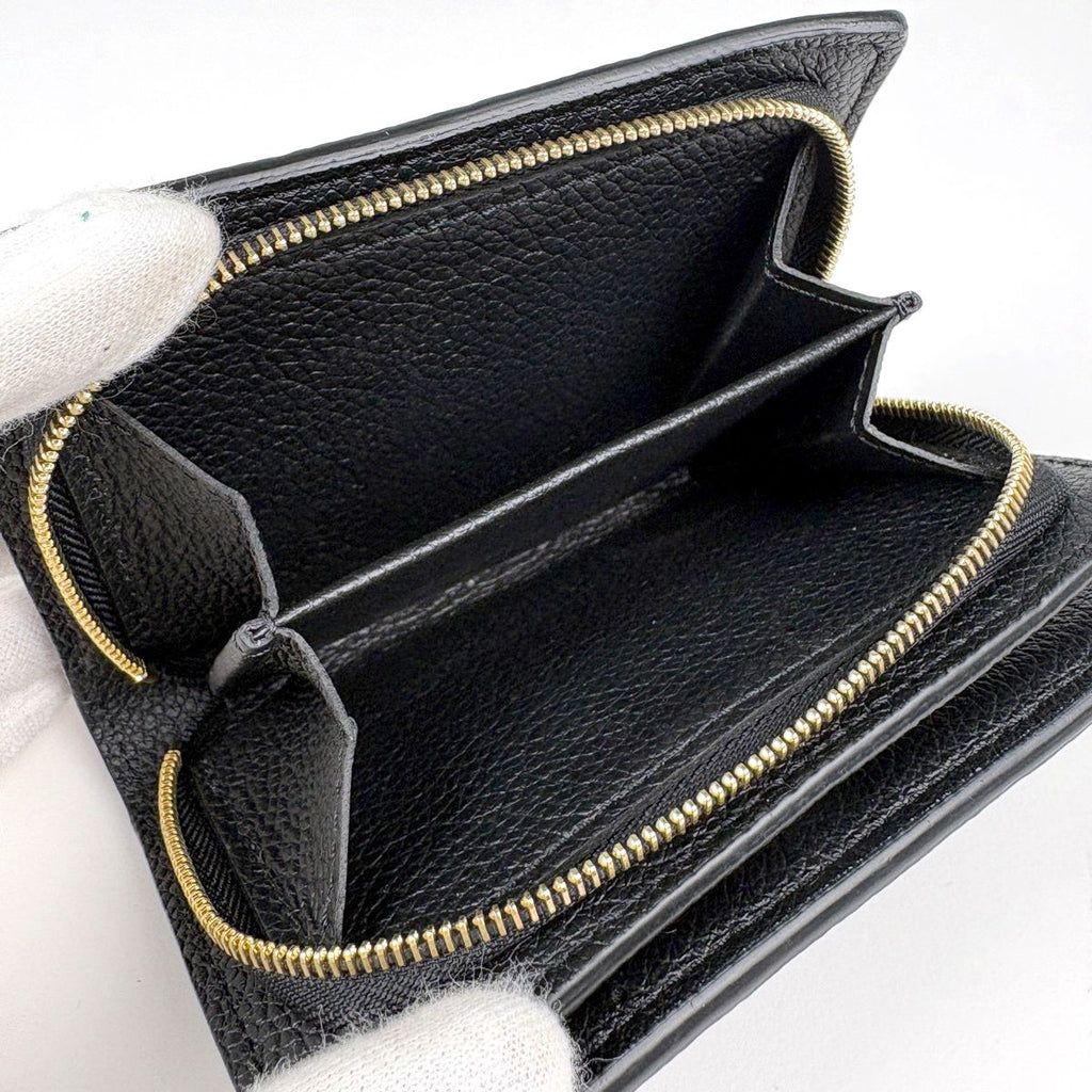 Louis Vuitton Portefeuille Clair Bifold Wallet Monogram Empreinte Noir — view 4
