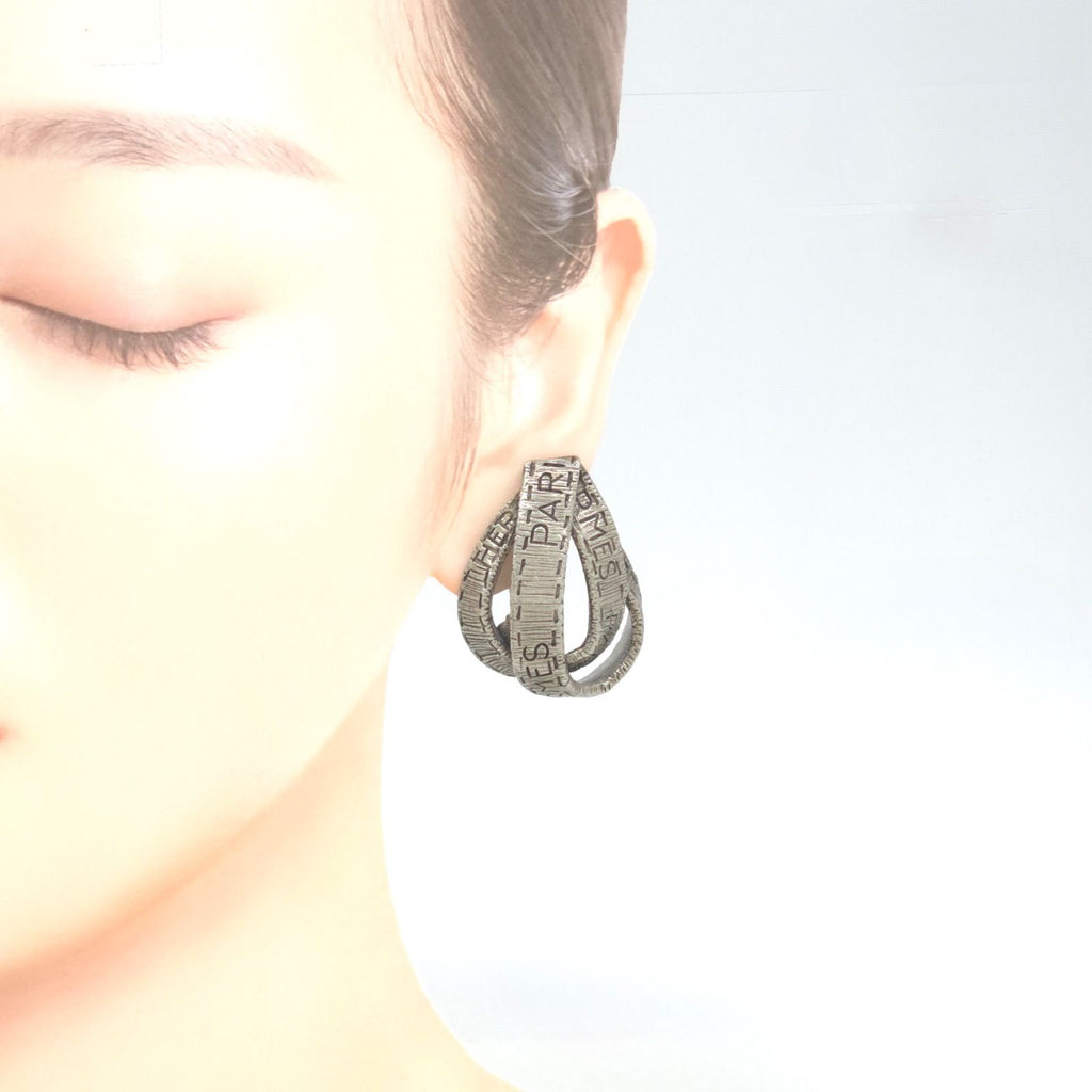 Hermes Logo Ribbon Motif Earrings Clip on Silver