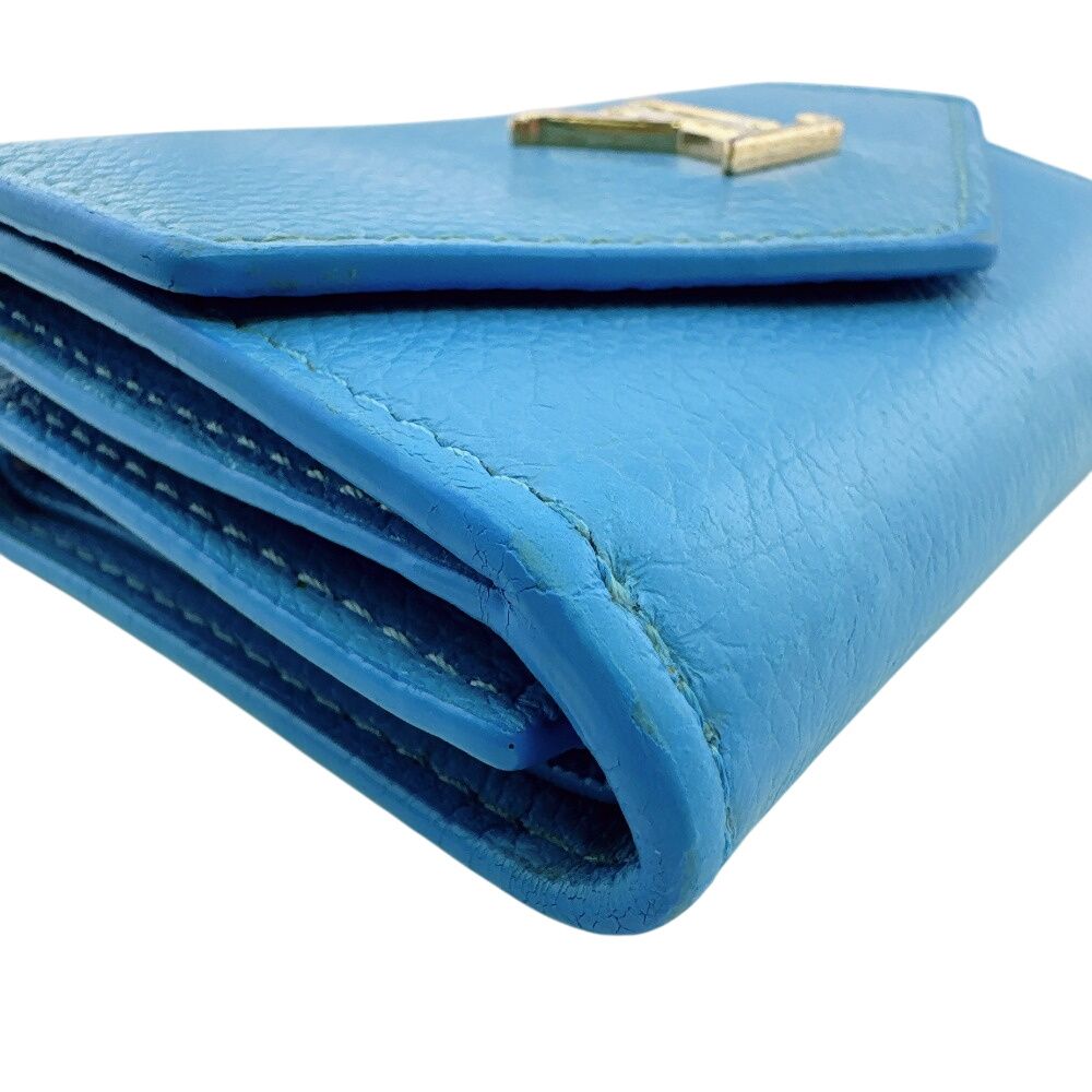 Louis Vuitton Portefeuille Lock Mini Taurillon Trifold Wallet — view 4