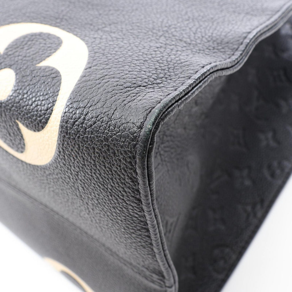 Louis Vuitton Tote Bag On The Go GM Monogram Empreinte LV Crafty 2-Way Black Beige — view 8