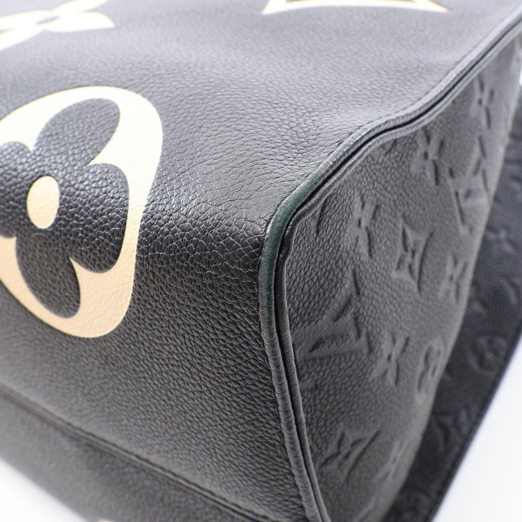 Louis Vuitton Tote Bag On The Go GM Monogram Empreinte LV Crafty 2-Way Black Beige — view 7