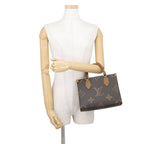 Louis Vuitton Monogram Reverse Giant On The Go PM 2-Way Shoulder Bag — view 4
