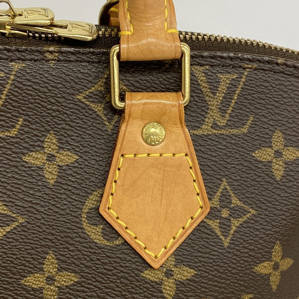Louis Vuitton Monogram Alma Brown Handbag — view 7