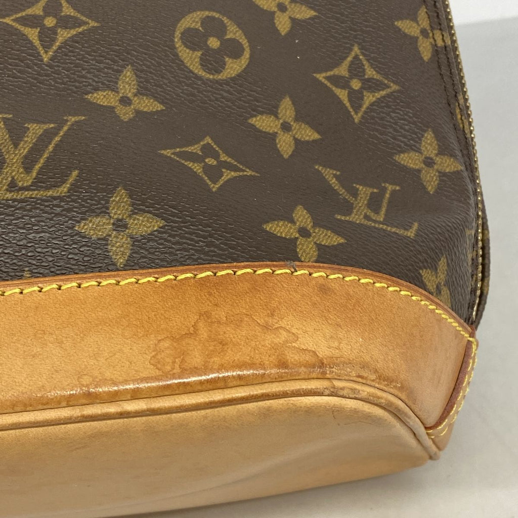 Louis Vuitton Monogram Alma Brown Handbag — view 6