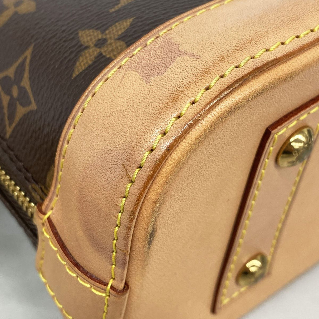 Louis Vuitton Monogram Alma BB Brown Handbag — view 6