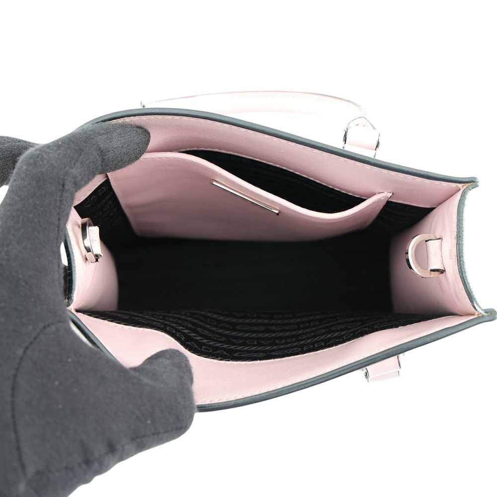 Prada Embossed Triangle Logo Mini Leather 2-Way Handbag — view 6
