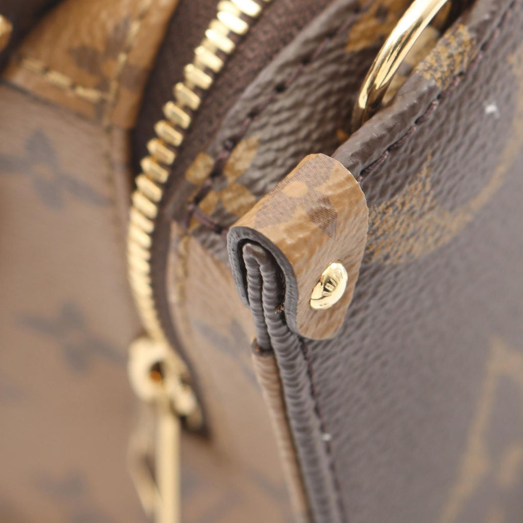 Louis Vuitton Handbag On The Go East West Chain Monogram Reverse 2-Way Canvas on — view 6