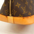 Louis Vuitton Monogram Alma Brown Handbag — view 8