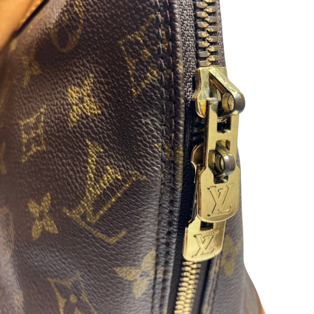 Louis Vuitton Alma Monogram Handbag Canvas — view 8