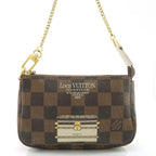 Louis Vuitton Mini Pochette Accessoires Damier Trunk Print Mini Pouch Included