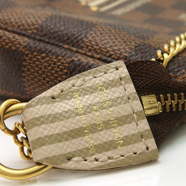 Louis Vuitton Mini Pochette Accessoires Damier Trunk Print Mini Pouch Included — view 7