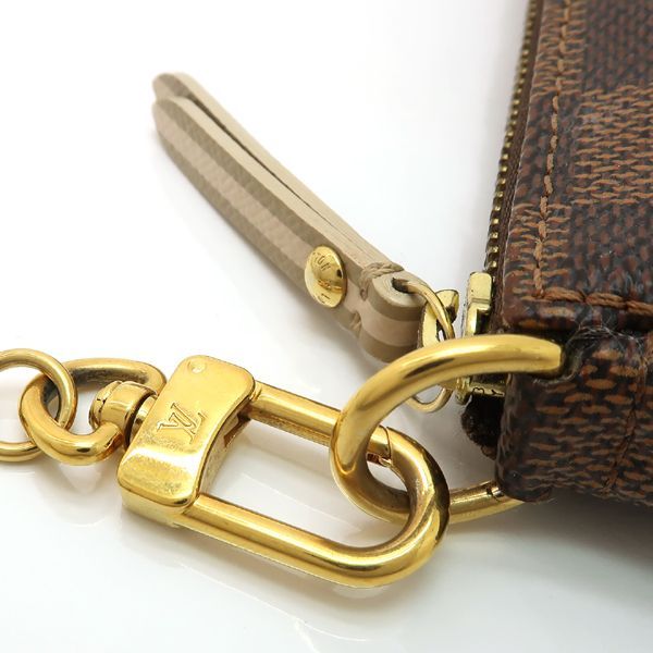 Louis Vuitton Mini Pochette Accessoires Damier Trunk Print Mini Pouch Included — view 8