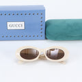 Gucci Oval Shape Sunglasses Eyewear
