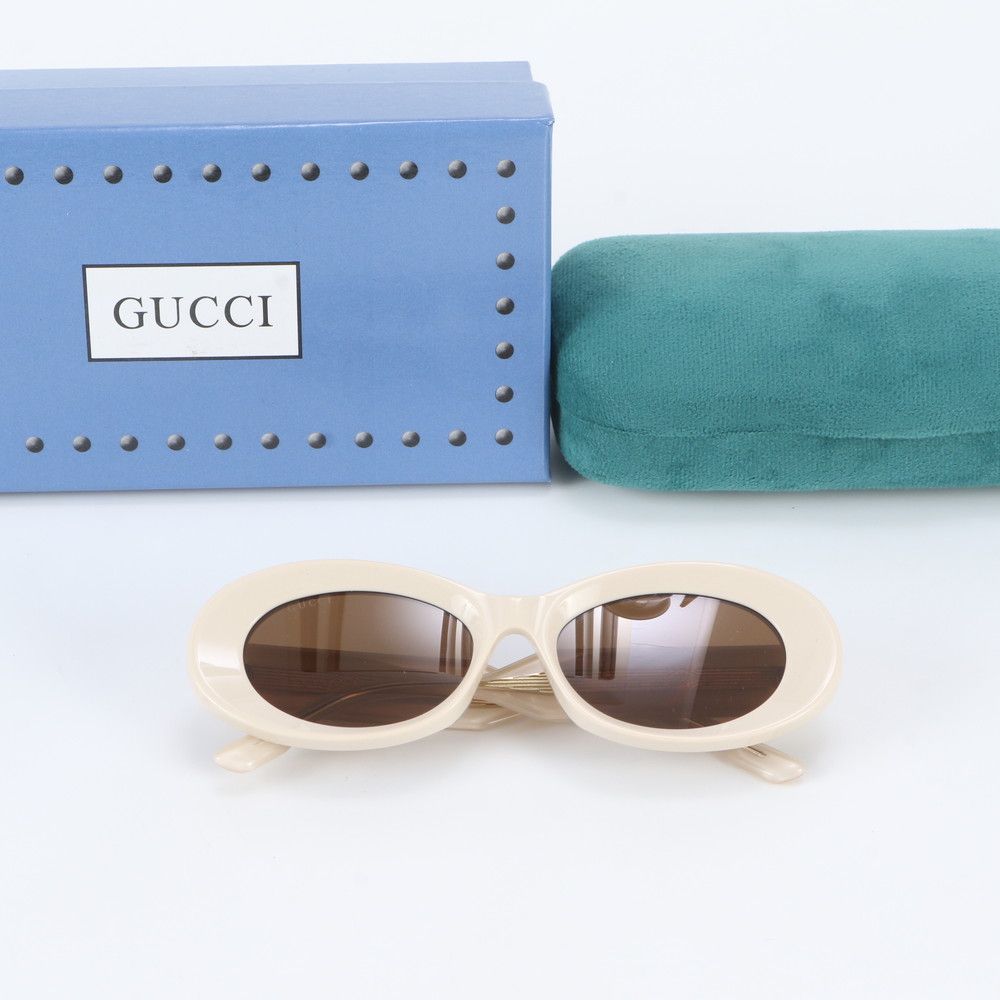 Gucci Oval Shape Sunglasses Eyewear