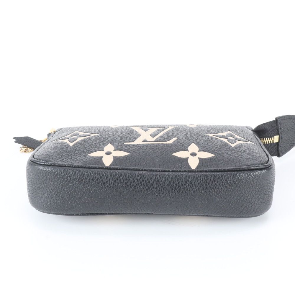 Louis Vuitton Monogram Empreinte Mini Pochette Accessoires Leather Handbag — view 5