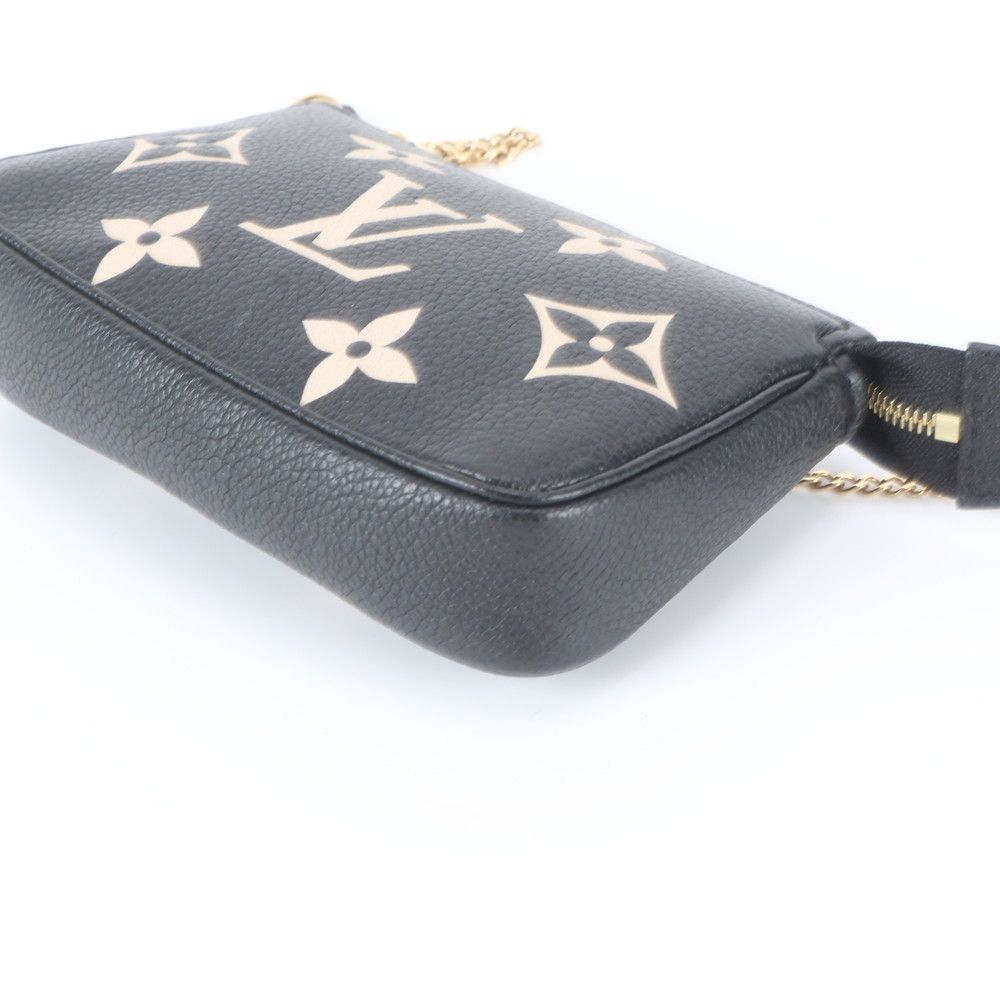 Louis Vuitton Monogram Empreinte Mini Pochette Accessoires Leather Handbag — view 6