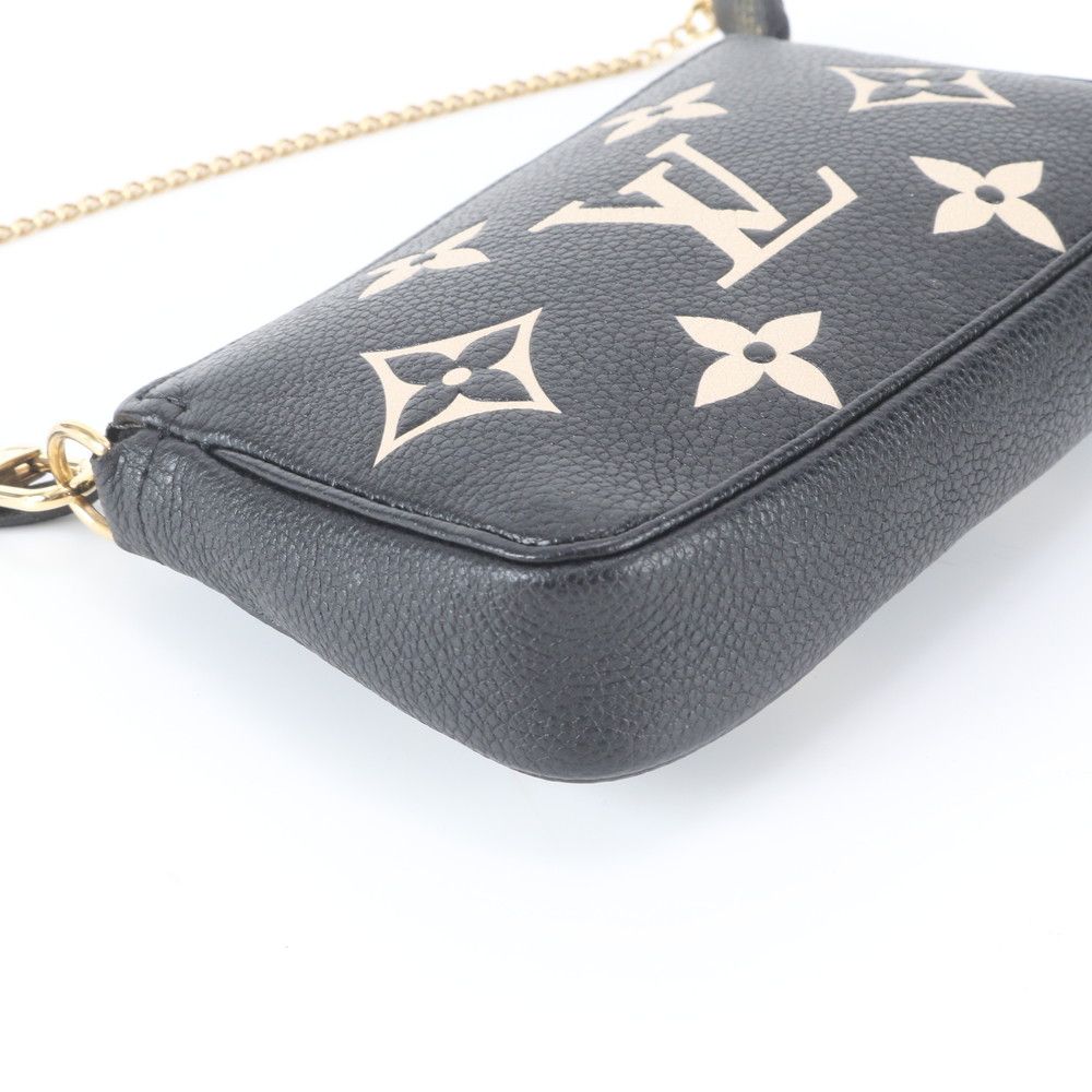 Louis Vuitton Monogram Empreinte Mini Pochette Accessoires Leather Handbag — view 4