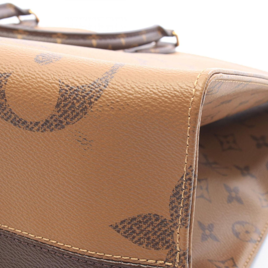 Louis Vuitton Shoulder Bag On The Go GM Monogram Giant Reverse Leather — view 6