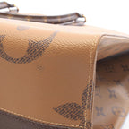 Louis Vuitton Shoulder Bag On The Go GM Monogram Giant Reverse Leather — view 6
