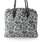 Prada Short Sleeve Silk Patent Triangle Logo Flower Drawstring Handbag White — view 2