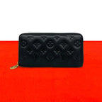 Louis Vuitton Zippy Wallet Coussin Monogram Empreinte Leather Black