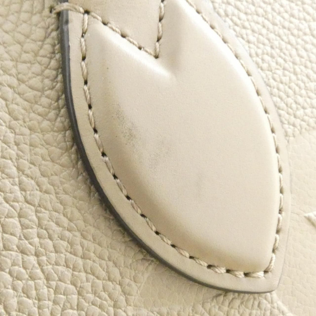 Louis Vuitton Monogram Empreinte On The Go MM Bag — view 3
