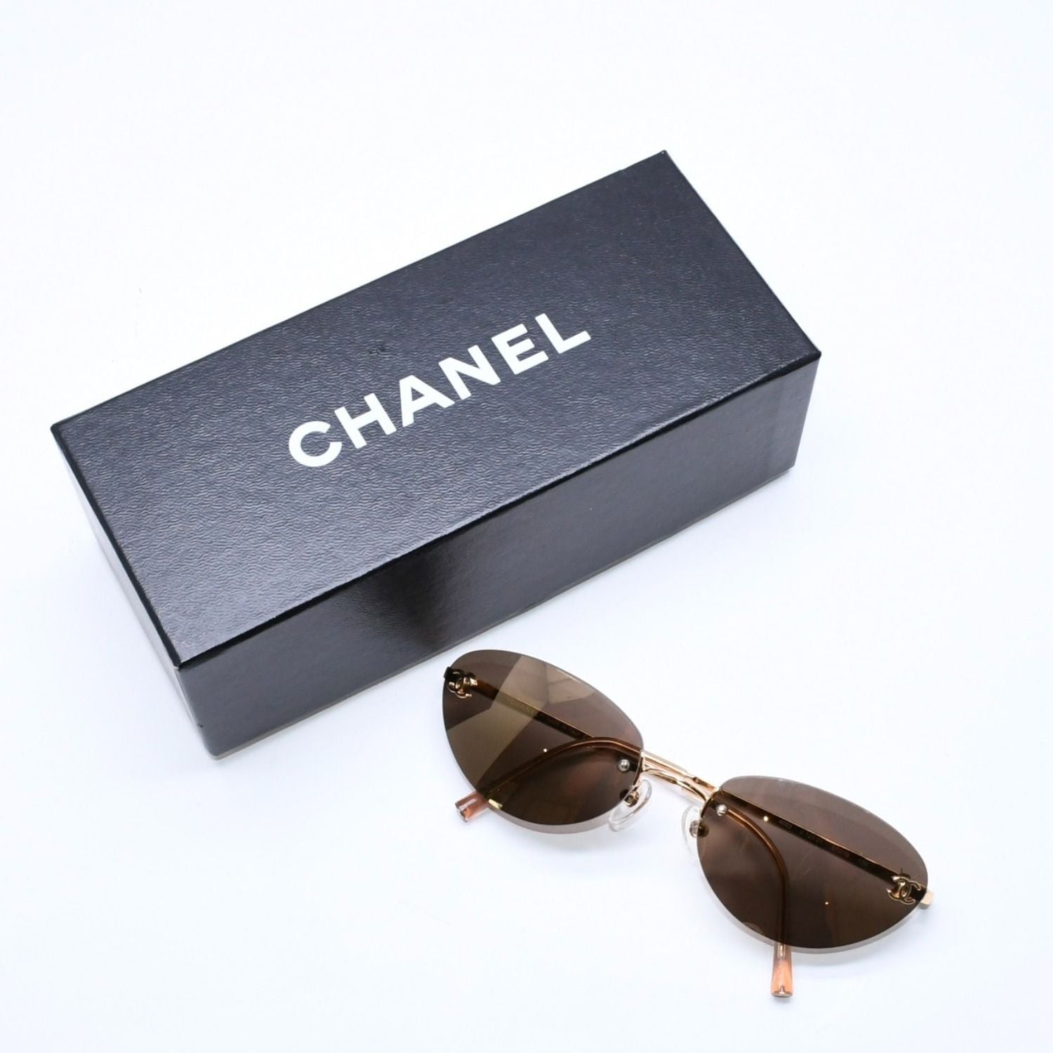 Chanel Rimless Sunglasses Eyewear CC Logo Gold