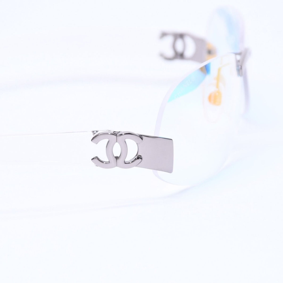 Chanel Rimless Sunglasses Eyewear CC Logo Aurora Clear — view 7