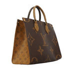 Louis Vuitton Tote Monogram Giant Reverse on the Go MM Brown — view 2