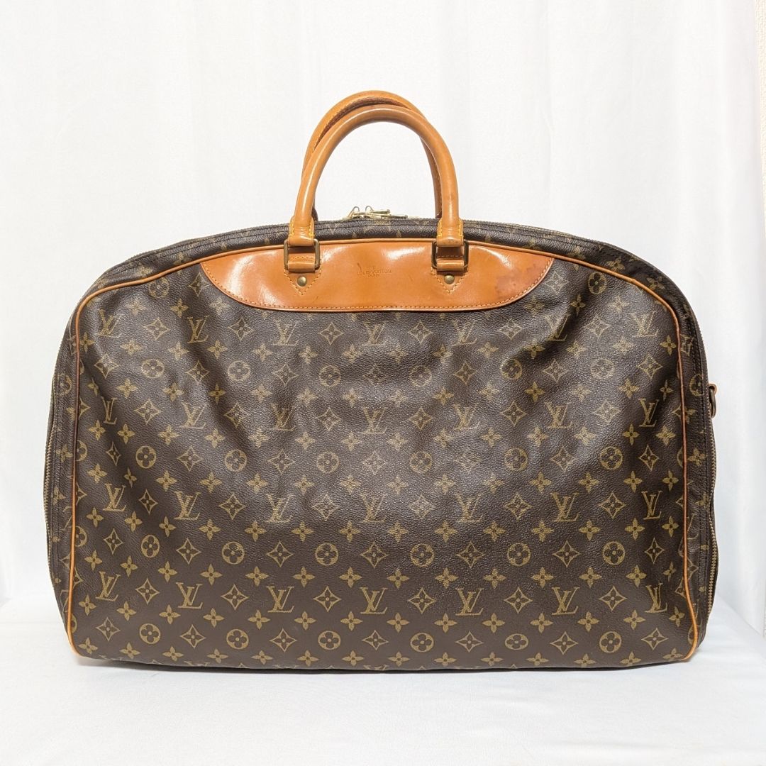 Louis Vuitton Alize de Poche Monogram Boston Bag