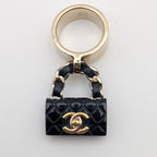 Chanel Ring CC Logo Turnlock Quilted Leather Bag Motif Black Gold — view 2