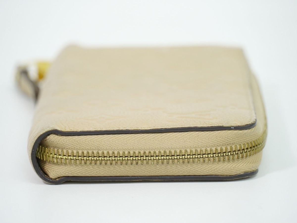 Louis Vuitton LV Zippy Wallet Monogram Empreinte Leather les Beiges — view 7