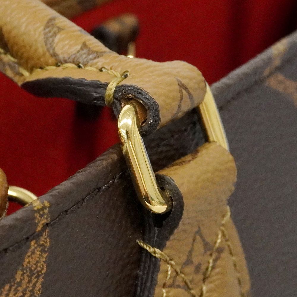 Louis Vuitton Handbag Monogram Giant Reverse on the Go PM Brown 2-Way Bag — view 7