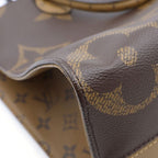 Louis Vuitton Monogram Reverse on the Go MM Tote Brown Leather Gold — view 6