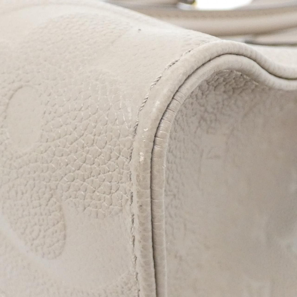 Louis Vuitton Monogram Empreinte on the Go MM Bag — view 2