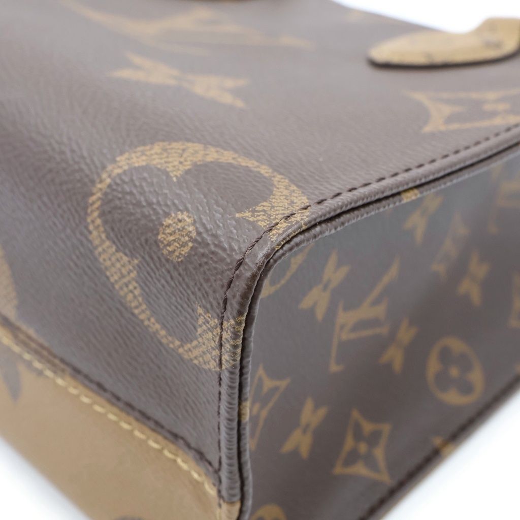 Louis Vuitton Monogram Giant Reverse on the Go PM Leather 2-Way Shoulder Bag — view 5