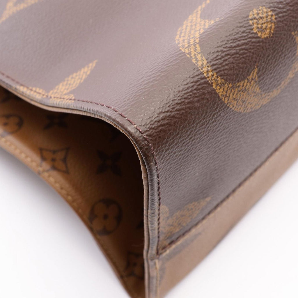 Louis Vuitton Shoulder Bag On The Go GM Monogram Giant Reverse Leather — view 6