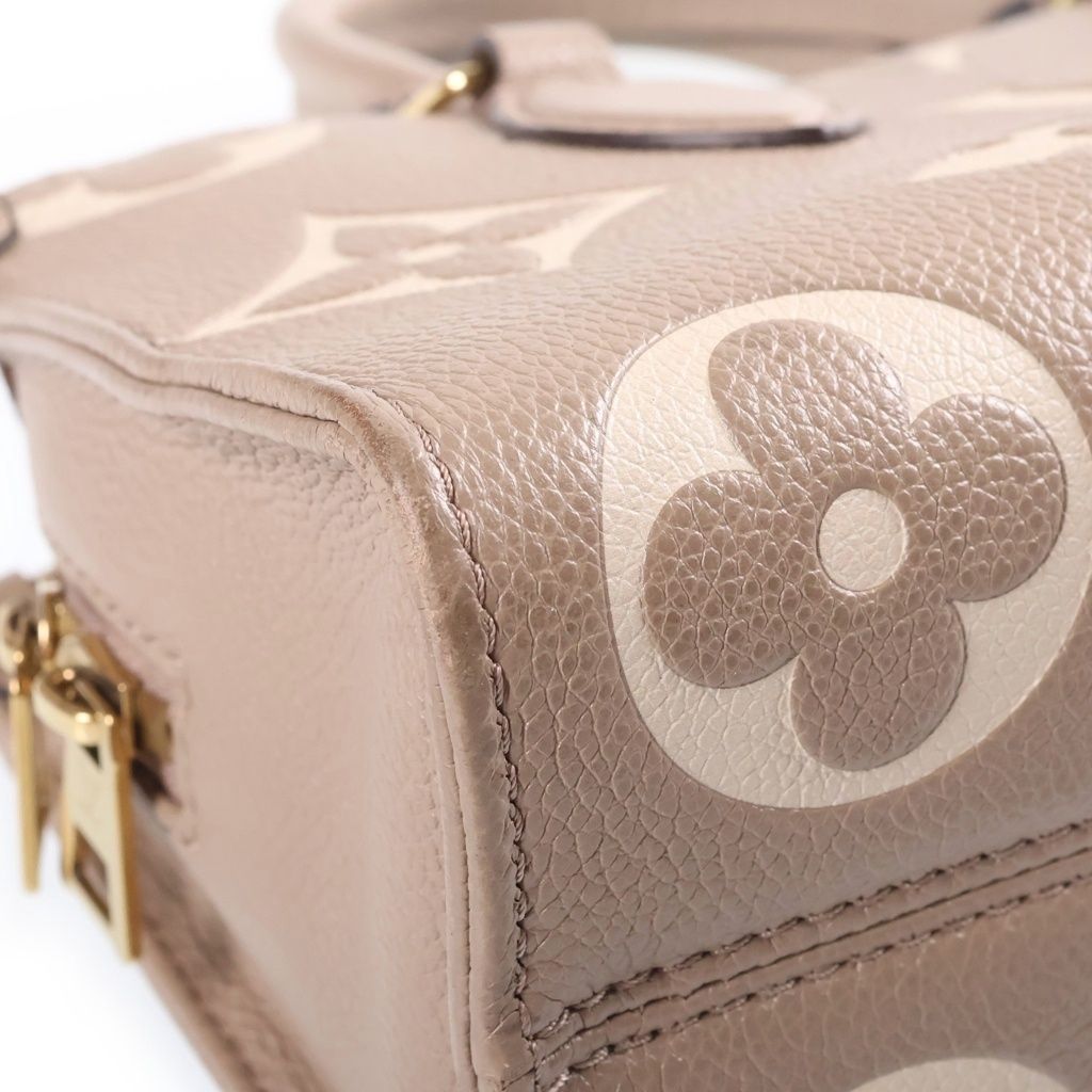 Louis Vuitton Monogram Empreinte Bicolor On The Go East West 2-Way Shoulder Bag — view 5