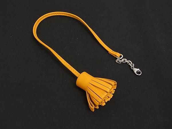 Hermes Carmencita Leather Silver Tassel Key Holder Charm Yellow