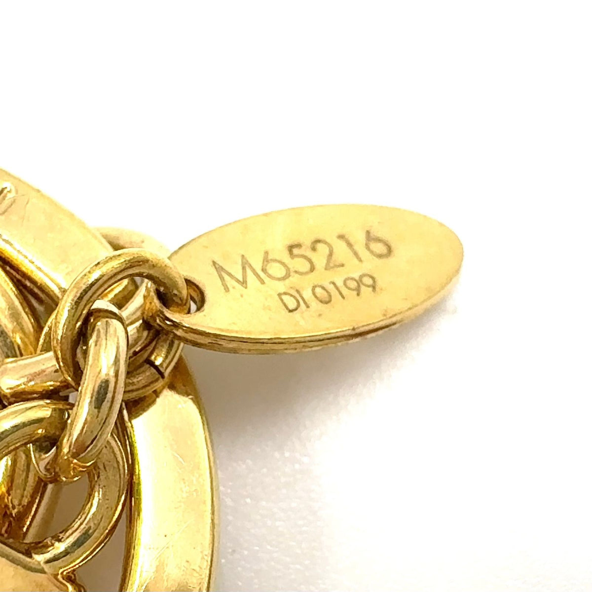 Louis Vuitton Porte Cles LV Facet Metal Gold Key Holder — view 4