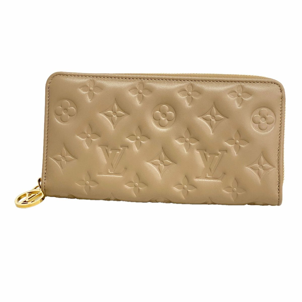 Louis Vuitton Wallet Monogram Embossed Zippy Taupe