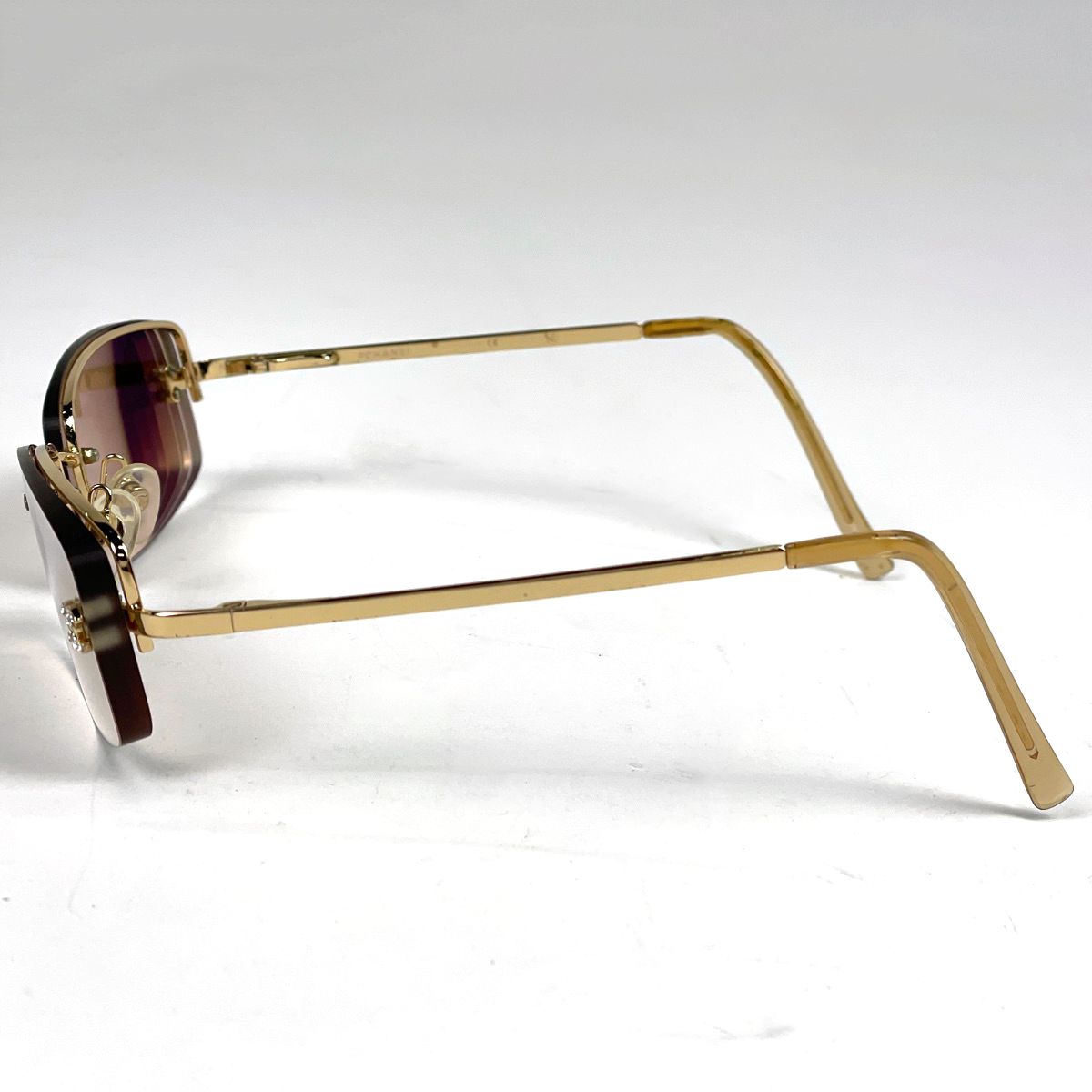 Chanel Sunglasses CC Logo Rimless Metal Rhinestone Brown Eyewear — view 2