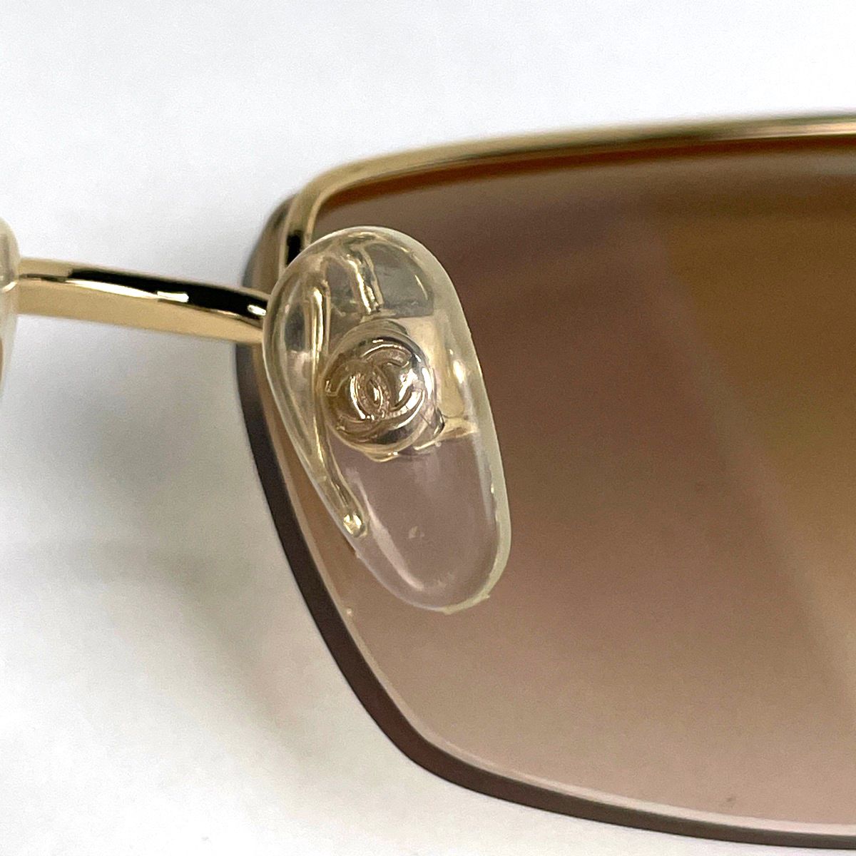 Chanel Sunglasses CC Logo Rimless Metal Rhinestone Brown Eyewear — view 4