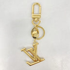 Louis Vuitton Key Holder Charm LV Facet Gold — view 4