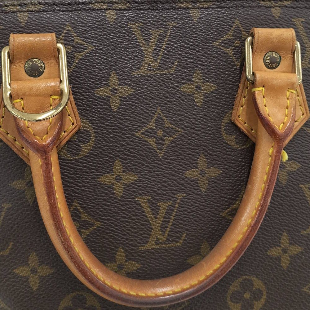 Louis Vuitton Alma Monogram Handbag — view 5