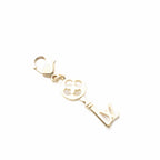 Louis Vuitton LV Charm Key Gold Colored Keychain — view 4