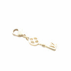 Louis Vuitton LV Charm Key Gold Colored Keychain — view 5